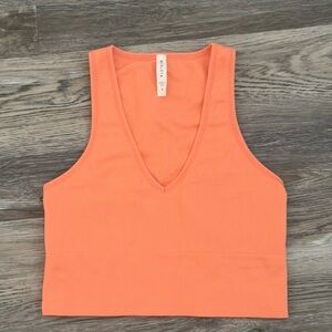 Orange Athleta sports bra top
